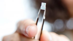 Optical processing glass integrated with CMOS